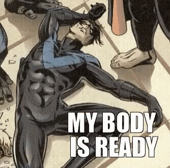 a man in a superhero costume is laying on the floor with his hands on his head .
