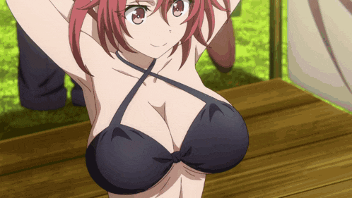 a girl with red hair is wearing a black bikini