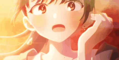 a close up of a girl with a surprised expression on her face