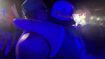 a man wearing a hat that says ' chase ' on it