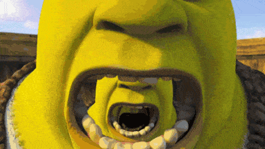 shrek from the movie shrek with his mouth open and teeth showing