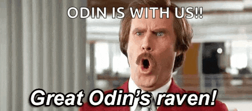 a man in a red suit and tie is saying `` odin is with us ! ''