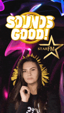 a woman stands in front of a sign that says " sounds good "
