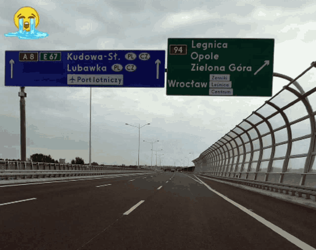 a highway with a sign that says kudowo-st. on it