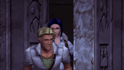 a man and a woman are standing next to each other in front of a wall that has the letter e on it