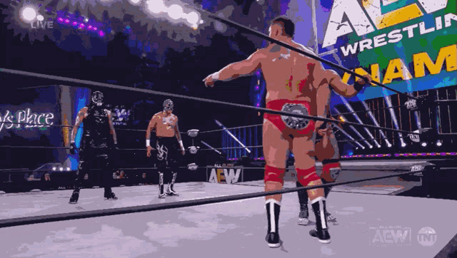 a wrestling ring with a sign that says " aew " on it