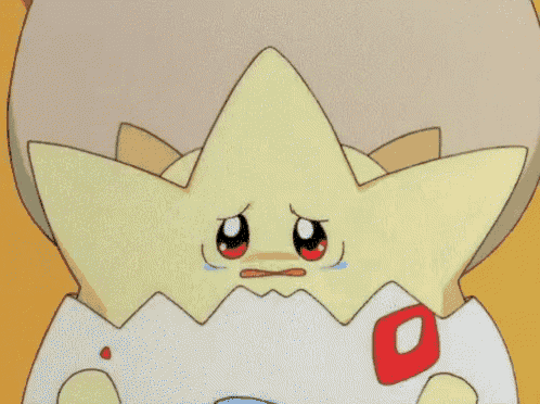 a cartoon character with a star shaped head is crying in an egg shell