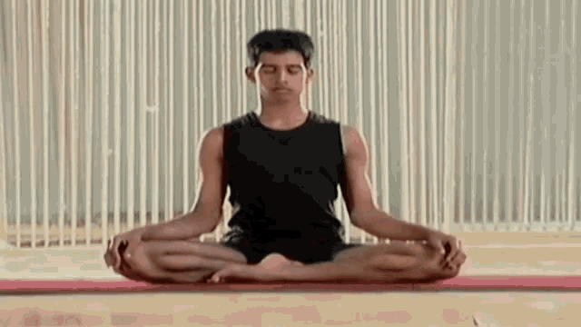Lotus Pose Leg Stretch GIF - Lotus Pose Leg Stretch Stretching GIFs