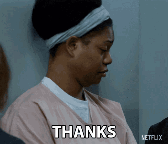 a woman with a headband on says thanks