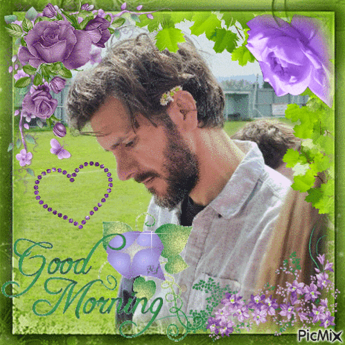 a man with a beard is surrounded by purple flowers and leaves and says good morning