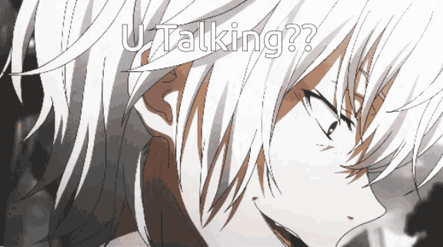 a close up of a person 's face with the words " u talking " on the bottom