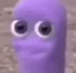 a close up of a purple cartoon character with big eyes and a smiling face .