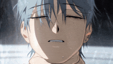 a close up of a person 's face with tears coming out of it