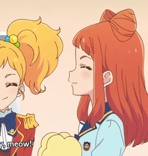 two anime girls are standing next to each other and one of them says y meow