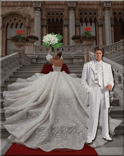 a man in a white suit stands next to a woman in a white wedding dress