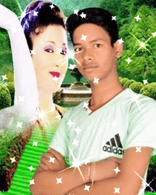 a boy wearing an adidas shirt stands in front of a picture of a woman