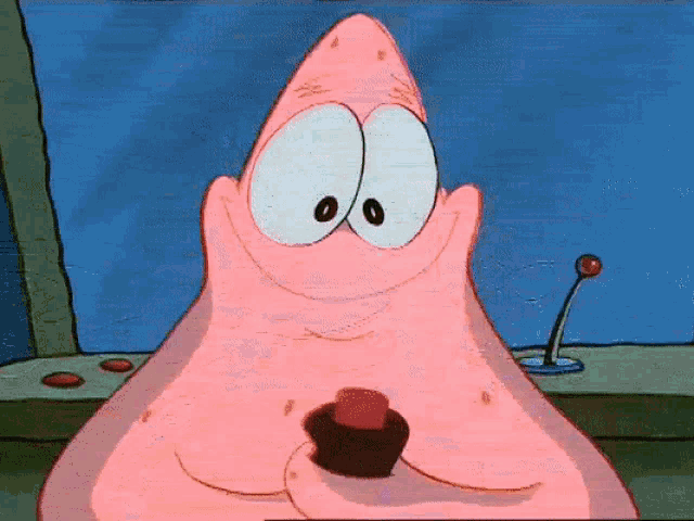 patrick star from spongebob is holding a red button in his hand