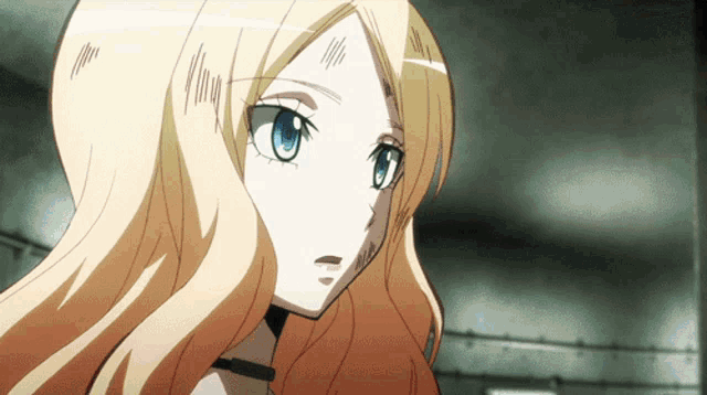 a girl with blonde hair and blue eyes is looking at the camera