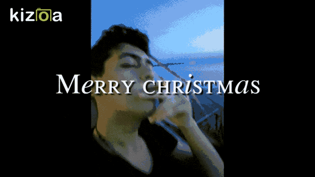 a picture of a man smoking a cigarette with the words merry christmas