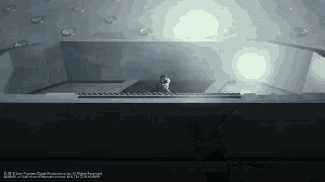 a picture of a man sitting on a staircase taken by sony digital productions inc.