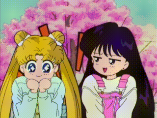 two anime girls are standing next to each other with their hands on their faces in front of a cherry blossom tree .