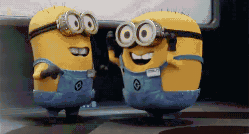 a couple of minions wearing goggles and overalls with the letter c on them