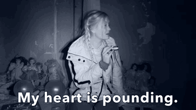 a black and white photo of a woman with the words " my heart is pounding "