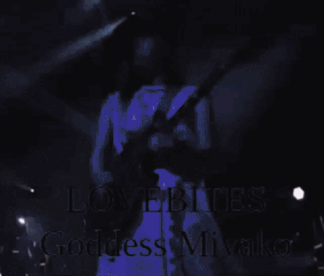 a woman in a white dress is holding a guitar and the words lovebites goddess miyako are on the bottom