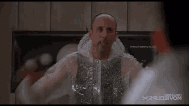a man is wrapped in plastic and says seasonic .