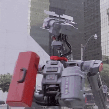 a robot with a red toolbox on its back has the letter n on it