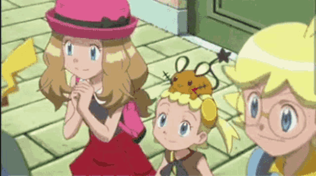 a group of three cartoon characters are standing next to each other on a brick sidewalk .