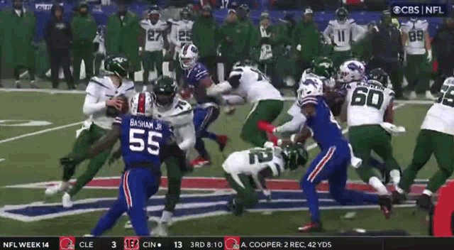 a football player with the number 55 on his jersey