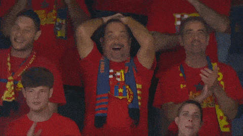 a man with a scarf around his neck that says ' fcb ' on it