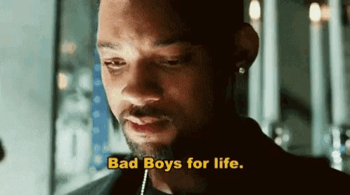 a man with a beard is crying and saying bad boys for life .