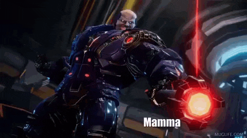 a man in a robot suit is holding a red object in his hand .