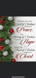 a blurry picture of a christmas tree with red and white ornaments and a christmas card .