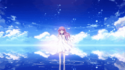 a girl in a white dress stands in a body of water