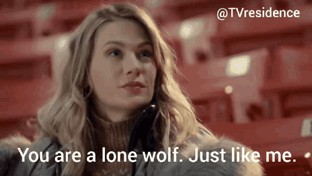a woman says " you are a lone wolf just like me " while sitting in a stadium