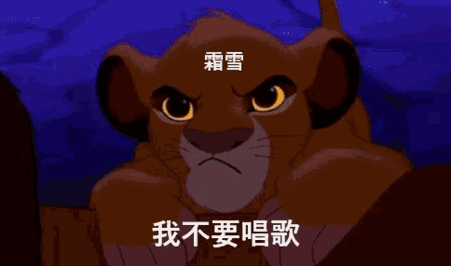 a lion is standing on top of a rock holding a lion 's head .