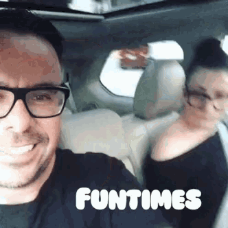 a man and a woman in a car with the words funtimes written on the bottom