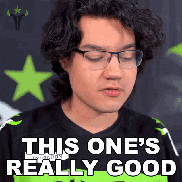 a man with glasses and a shirt that says this one 's really good on it