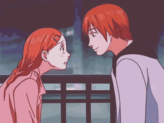 a boy and a girl looking at each other