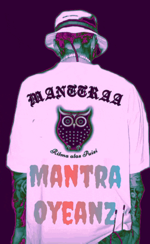 a man wearing a white shirt that says mantra oyenzi