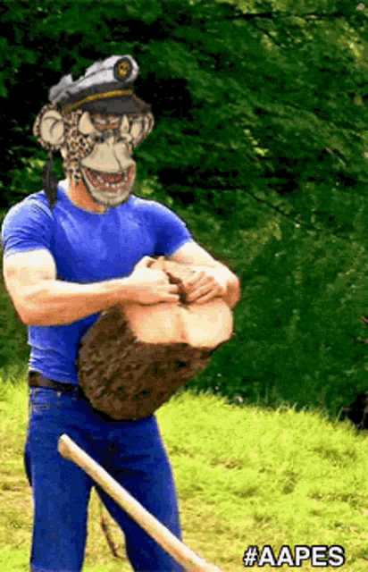a man with a monkey face on his face is holding a log