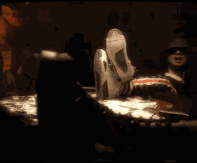 a person is laying on a table with their feet up