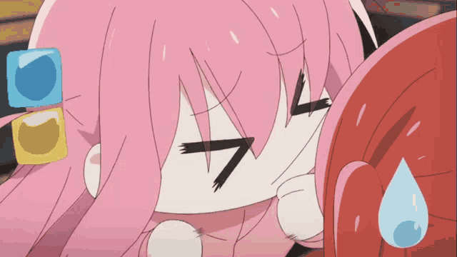 a close up of a pink anime character 's face