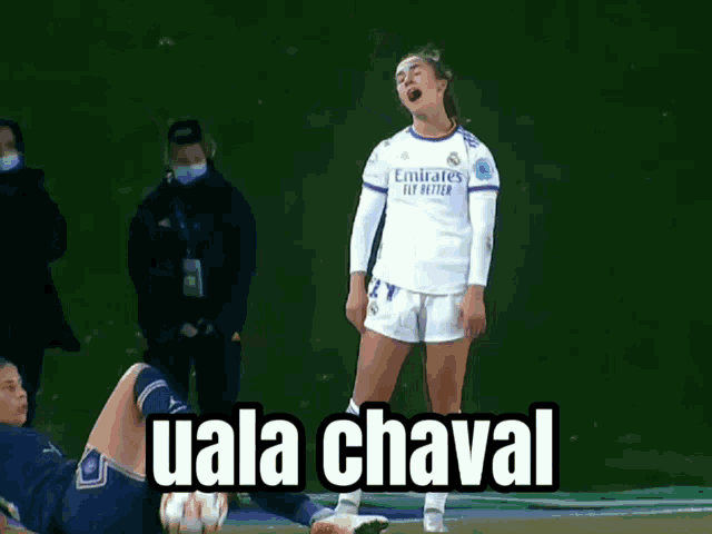 a female soccer player wearing a emirates fly better jersey