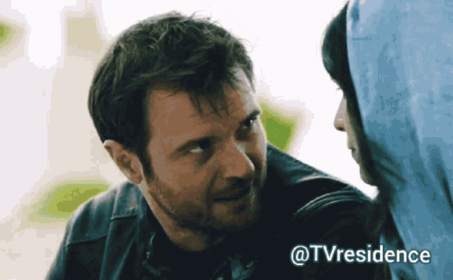 a man and a woman are looking at each other with the words @tvresidence written below them