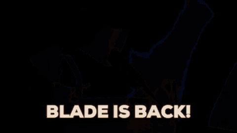 a person is holding a hook in their hand with the words `` blade is back '' written below it .