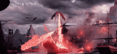 a dragon is flying over a burning ship in the water
